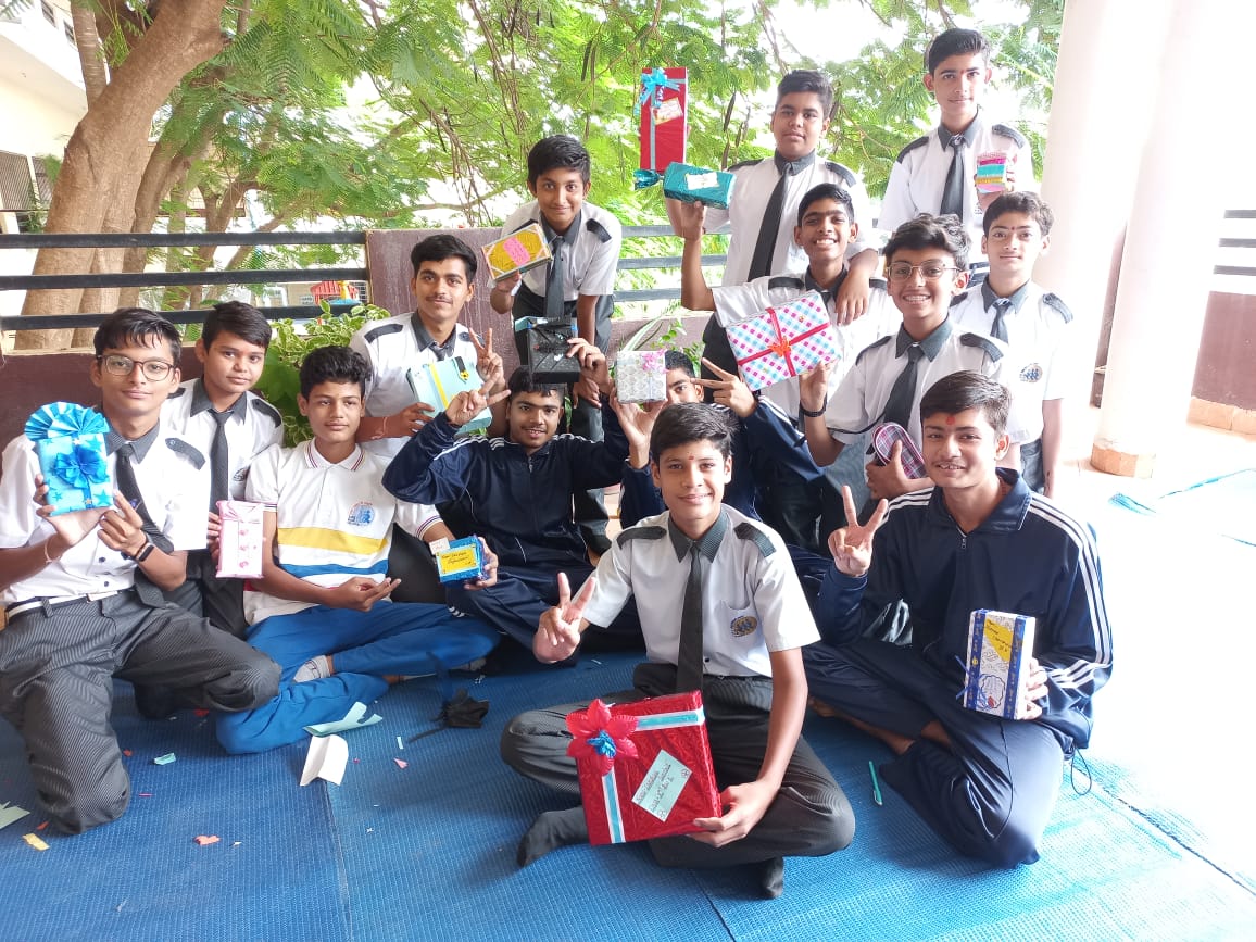 Gift Wrapping Activity organised at school on the occasion of Rakshabandhan ( For Boys) 